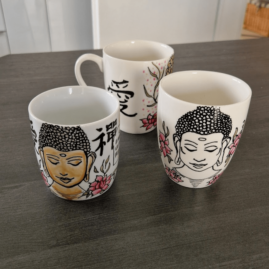 Drei Tassen mit Buddha Motiv